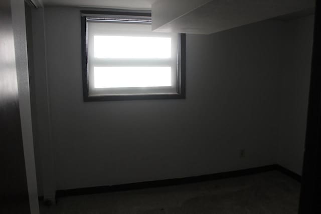 empty room with baseboards