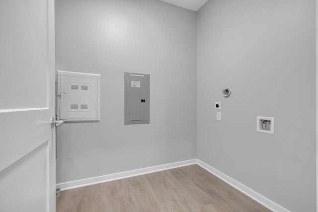 500 E Main St Unit 203, Waterford, WI 53185 - clothes washing area with hookup for a washing machine, hookup for an electric dryer, laundry area, electric panel, and baseboards