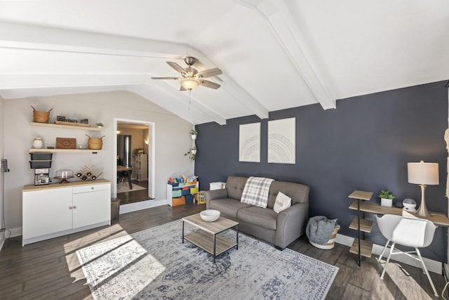 living area with dark wood finished floors, a ceiling fan, lofted ceiling with beams, and baseboards