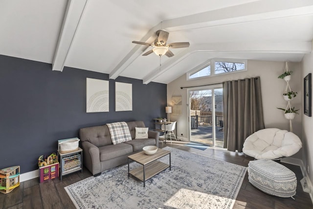 living area with a ceiling fan, wood finished floors, baseboards, vaulted ceiling with beams, and an accent wall