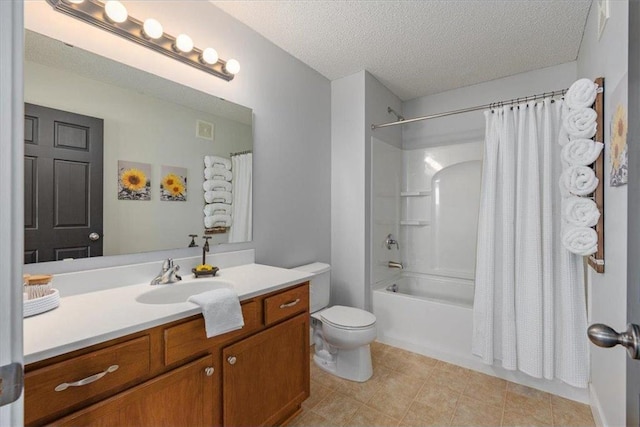 full bath featuring a textured ceiling, toilet, vanity, and shower / tub combo