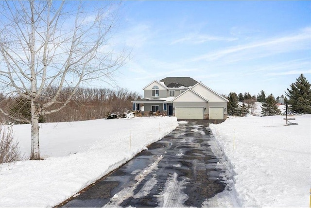 view of front of property featuring a garage