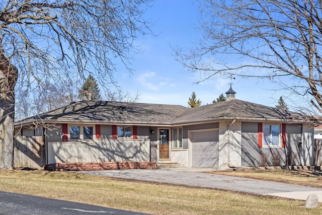 ranch-style house with brick siding, a chimney, a shingled roof, a garage, and driveway