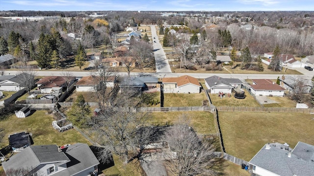 birds eye view of property with a residential view