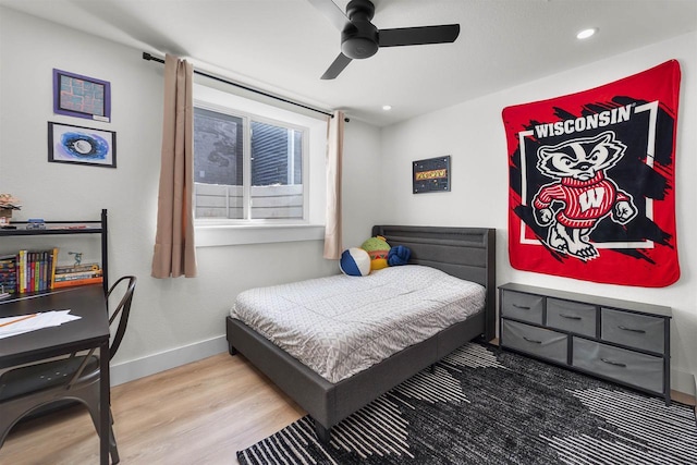 bedroom with recessed lighting, ceiling fan, baseboards, and wood finished floors