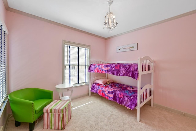 bedroom featuring baseboards, carpet floors, a notable chandelier, and crown molding