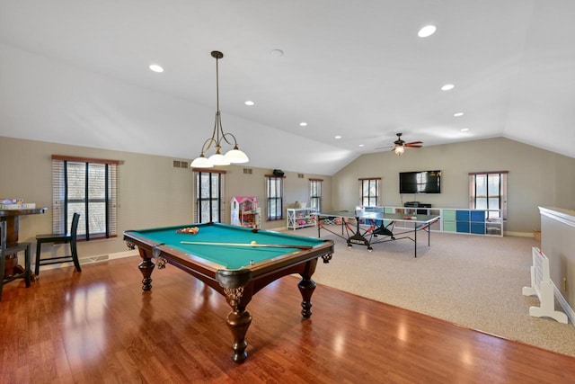 rec room with recessed lighting, baseboards, and vaulted ceiling