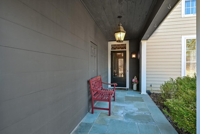 entrance to property featuring a porch