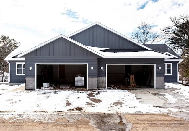 view of snow covered garage