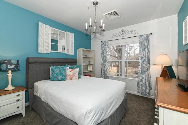 bedroom featuring an inviting chandelier, baseboards, visible vents, and dark carpet