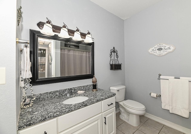 full bathroom featuring toilet, tile patterned floors, vanity, baseboards, and a shower with curtain