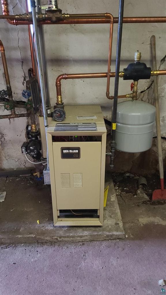 utility room with a heating unit