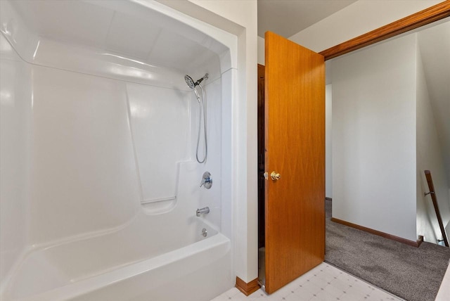 full bathroom with shower / bathing tub combination, tile patterned floors, and baseboards