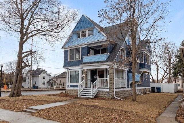 view of front of property with fence