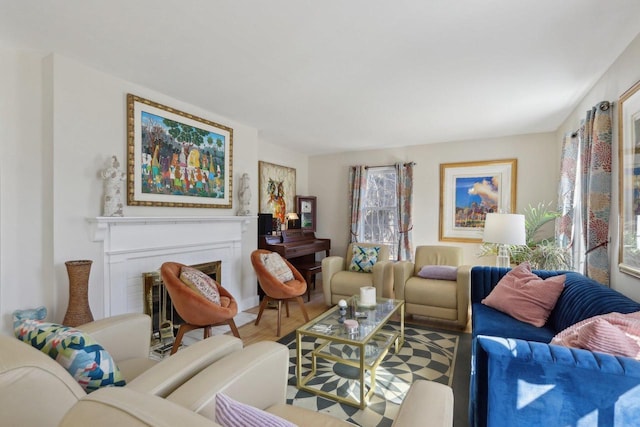 living room featuring a fireplace and wood finished floors