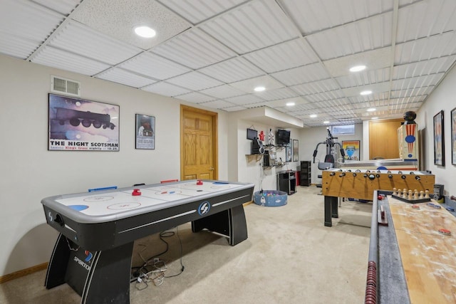 rec room featuring carpet floors, a paneled ceiling, recessed lighting, visible vents, and baseboards