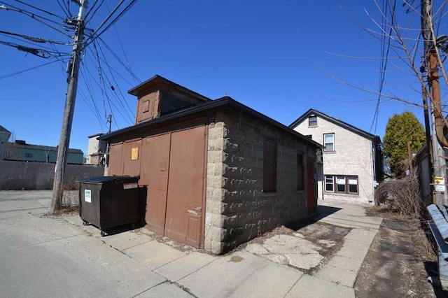 view of property exterior featuring stone siding