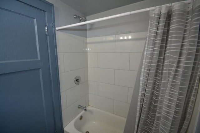 full bathroom featuring shower / tub combo with curtain