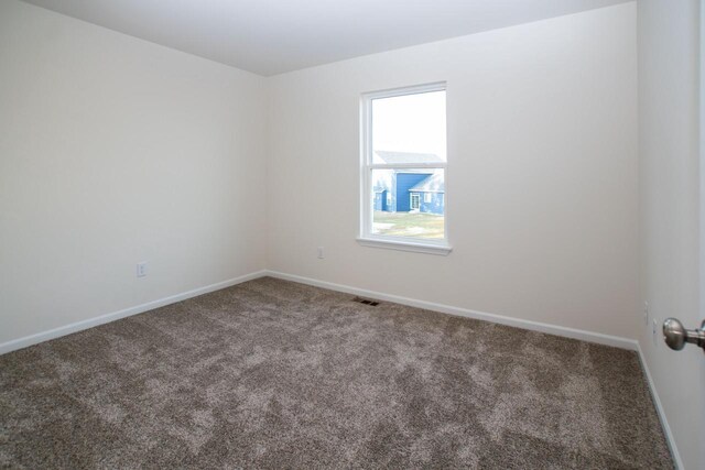 408 Canterbury Ct Unit Lt151Jackson, Williams Bay, WI 53191 - unfurnished room with carpet floors, visible vents, and baseboards
