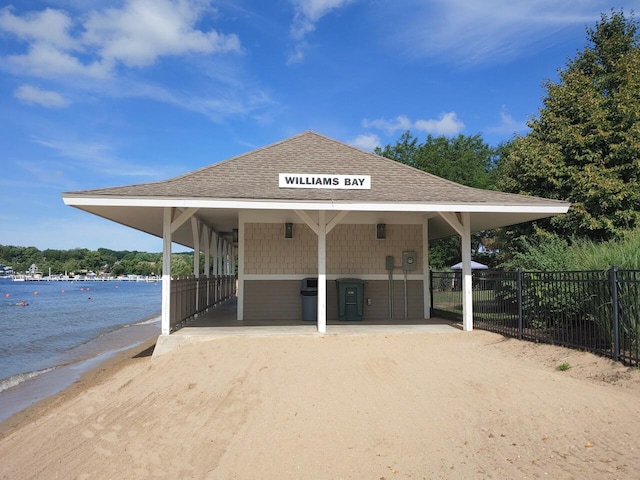 408 Canterbury Ct Unit Lt151Jackson, Williams Bay, WI 53191 - exterior space with a water view, fence, and a carport