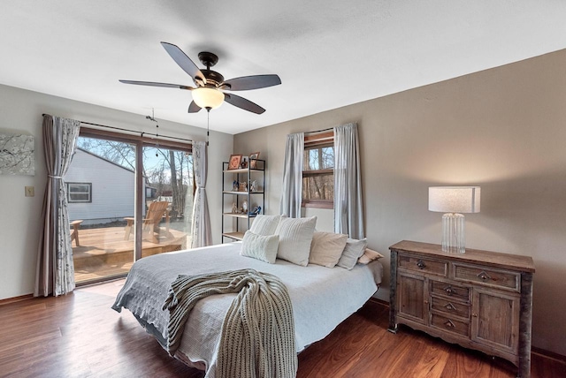 bedroom with dark wood finished floors, access to exterior, and ceiling fan