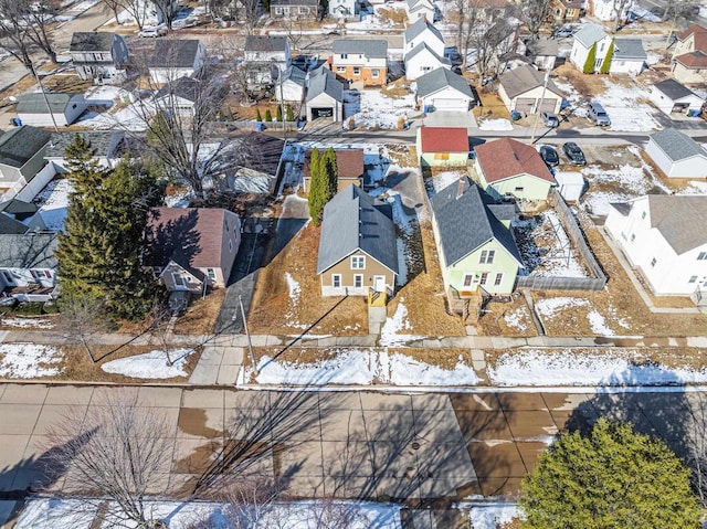 birds eye view of property with a residential view