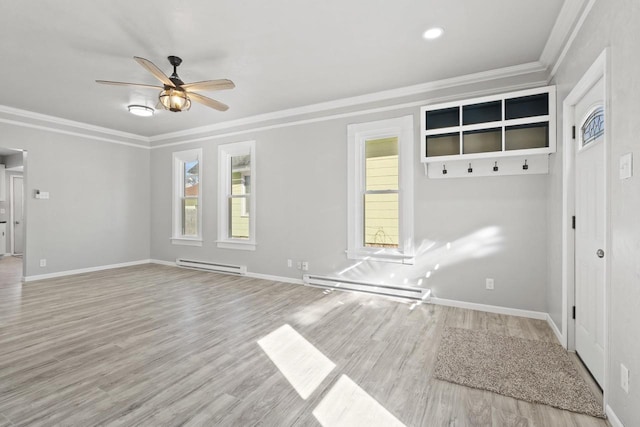 unfurnished living room with baseboards, crown molding, a baseboard heating unit, and wood finished floors