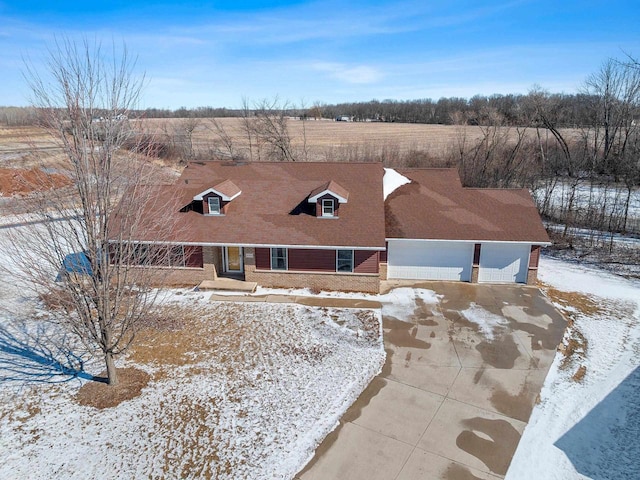 view of front of house with a porch and concrete driveway