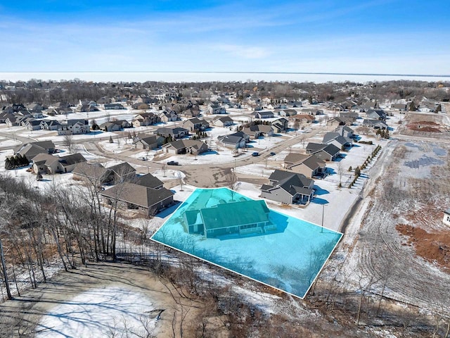 birds eye view of property with a residential view