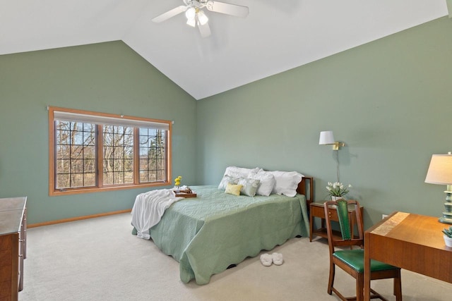 carpeted bedroom with lofted ceiling, baseboards, and ceiling fan