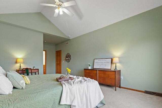 bedroom featuring visible vents, light carpet, a ceiling fan, baseboards, and vaulted ceiling