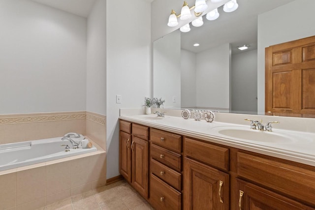 full bathroom featuring tile patterned flooring, double vanity, a garden tub, and a sink