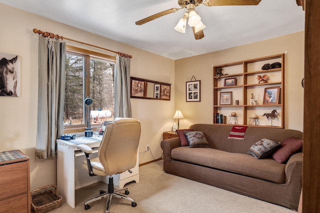 office with carpet floors and ceiling fan