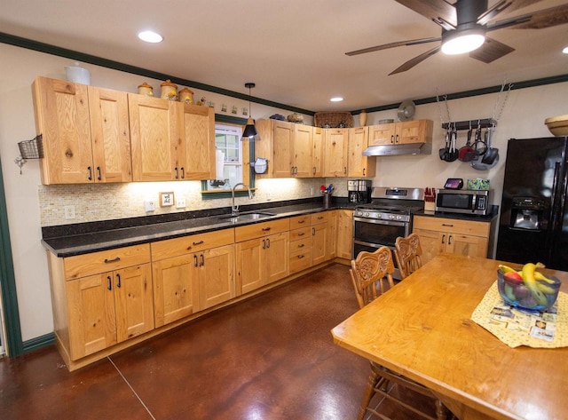 kitchen featuring appliances with stainless steel finishes, a sink, under cabinet range hood, and decorative backsplash