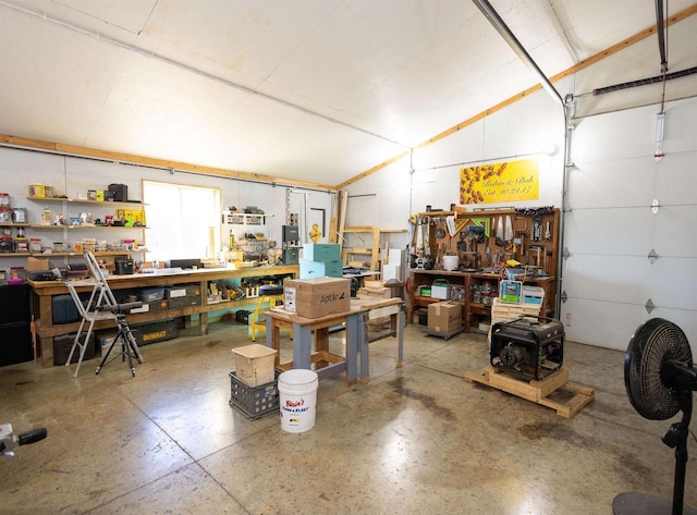 garage with a workshop area