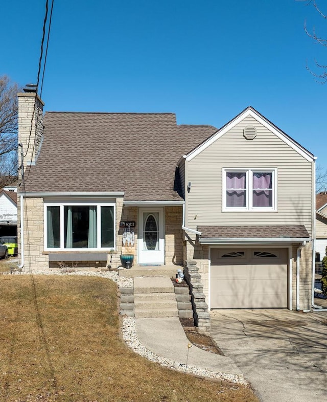 view of front of property featuring a shingled roof, stone siding, a chimney, and an attached garage