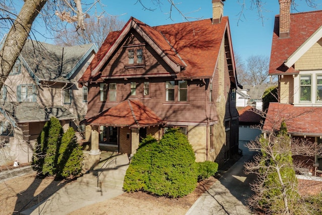 view of front of house featuring brick siding