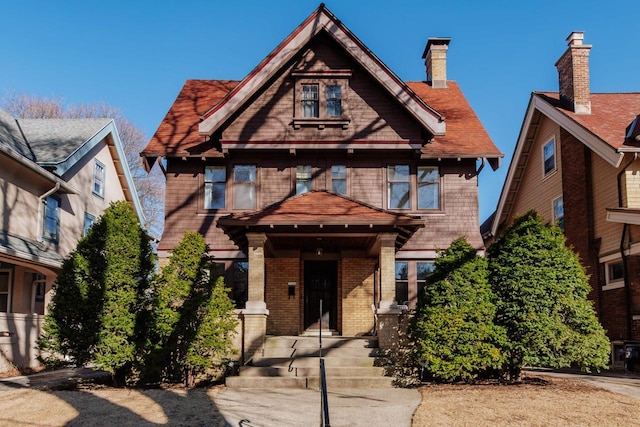 view of front of home featuring brick siding