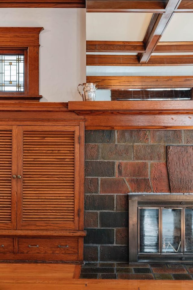 room details with a glass covered fireplace