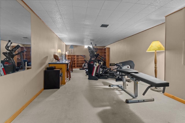 exercise room with baseboards