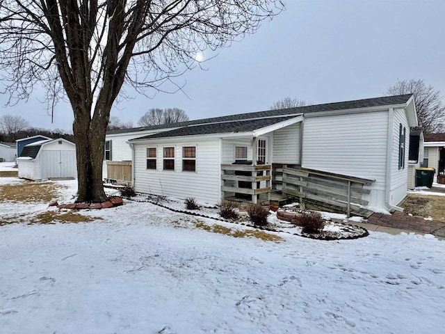 2701 E Main St Unit 118, Reedsburg, WI 53959 - view of front facade featuring an outbuilding and a shed