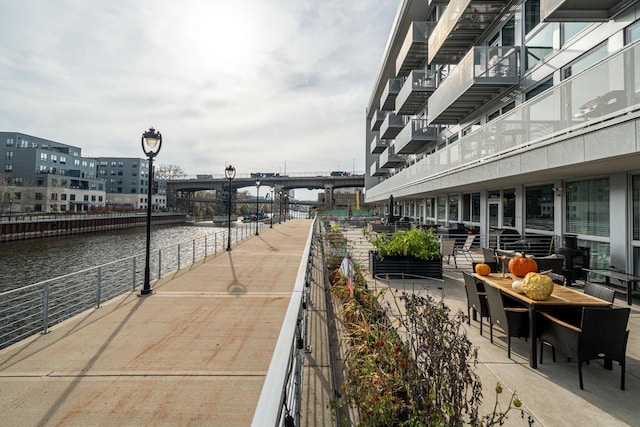 surrounding community featuring a water view