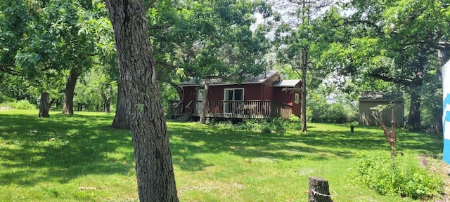 view of yard with a deck