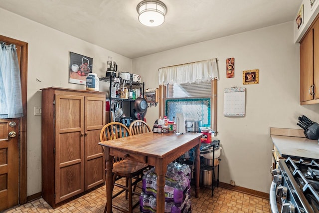 dining room featuring baseboards