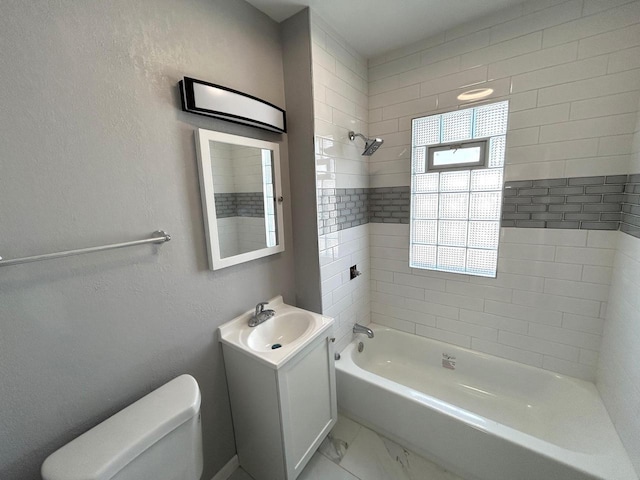 full bathroom with vanity, shower / bath combination, toilet, a textured wall, and marble finish floor