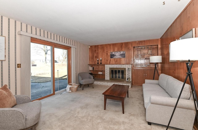 living room featuring a brick fireplace and light colored carpet