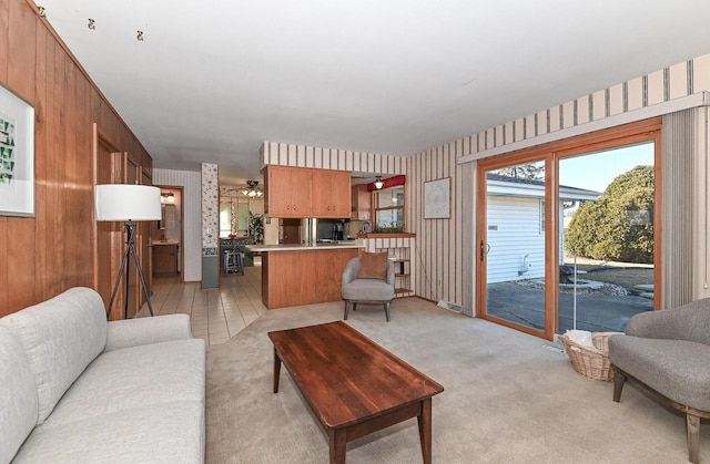 living area featuring light colored carpet