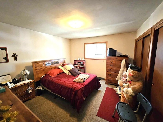 bedroom featuring carpet flooring