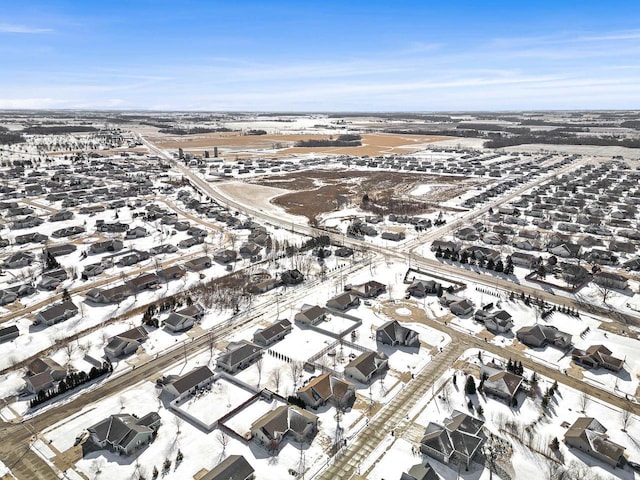 birds eye view of property with a residential view