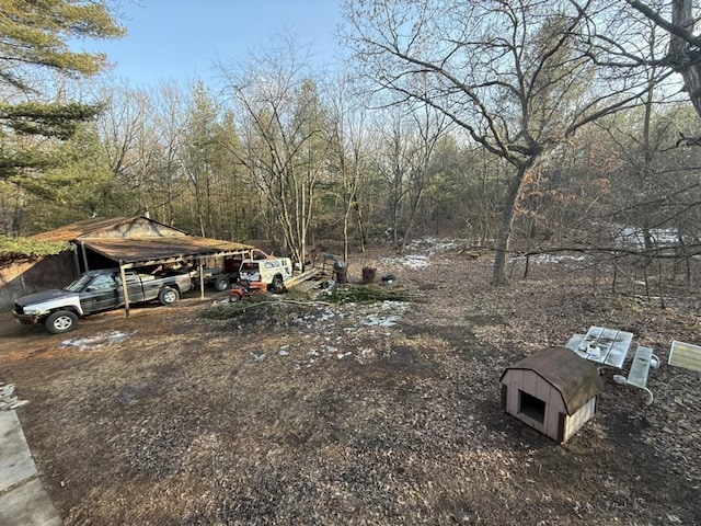 view of yard with a carport